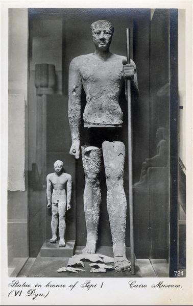Gallery in the Egyptian Museum in Cairo. Bronze statue of Pharaoh Pepi I, 6th dynasty. Album “Cartes postales” (Postcards).