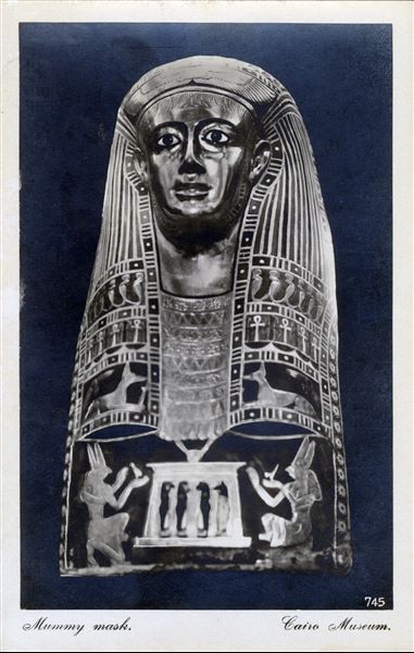 Gallery in the Egyptian Museum in Cairo. Mummy mask. Album “Cartes postales” (Postcards).