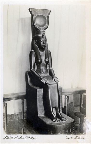Gallery in the Egyptian Museum in Cairo. Statue of the goddess Isis. Album “Cartes postales” (Postcards).