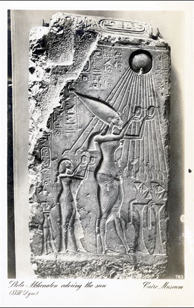 Gallery in the Egyptian Museum in Cairo. Stela of Pharaoh Akhenaten, worshipping the Aten (the sun). Album “Cartes postales” (Postcards).