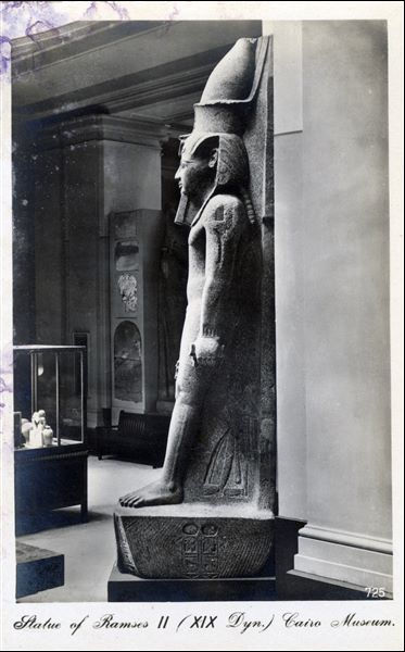 Gallery in the Egyptian Museum in Cairo. Colossal statue of Pharaoh Ramesses II. Album “Cartes postales” (Postcards).