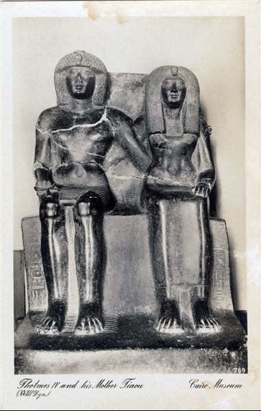 Gallery in the Egyptian Museum in Cairo. Statue of Pharaoh Thutmose IV and his mother Tiaa, 18th dynasty. Album “Cartes postales” (Postcards).