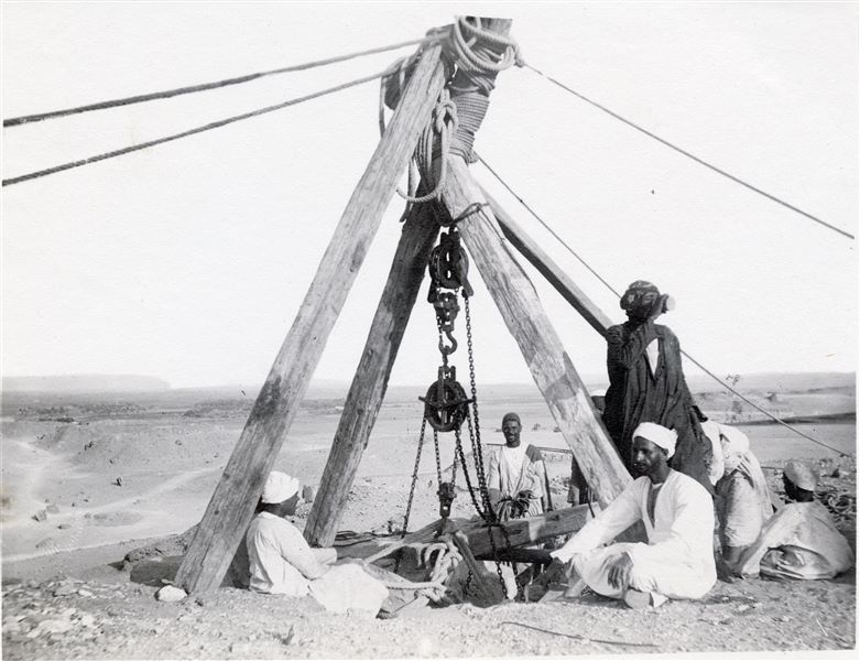 Photograph taken during the removal of the pink granite sarcophagus from the tomb of Prince Duaenra, son of Pharaoh Khufu, in the western Necropolis at Giza, conducted by the Italian Archaeological Mission. Schiaparelli excavations. 