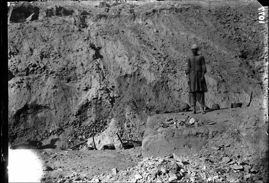 Excavation of an unidentified mastaba. The worker is also unrecognisable as he is moving and out of focus. Schiaparelli excavations.