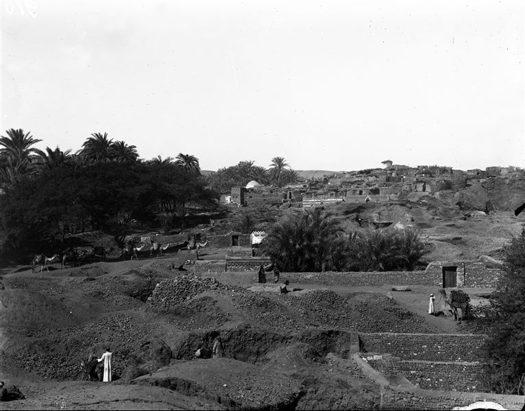 View of the landscape and village near the archaeological site of Ashmunein. Schiaparelli excavations.