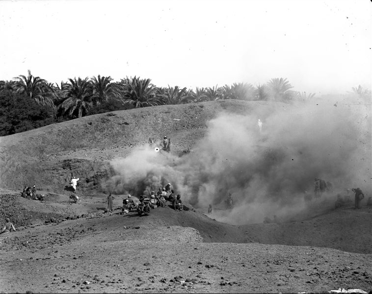 Excavating on the site, near a palm grove. Schiaparelli excavations. 
