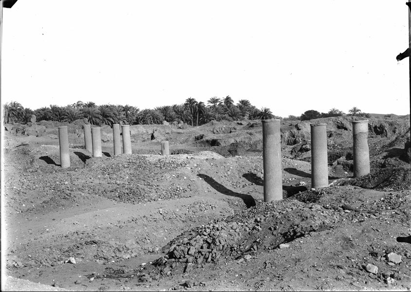 Excavation area of the site, there are several columns without capitals visible. Possibly part of an agora or a Christian basilica. Schiaparelli excavations.
