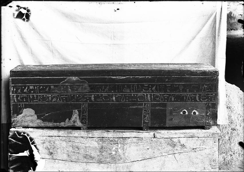 Coffin datable to the Middle Kingdom, photographed near the camp. S. 8918. East side. Schiaparelli excavations. 