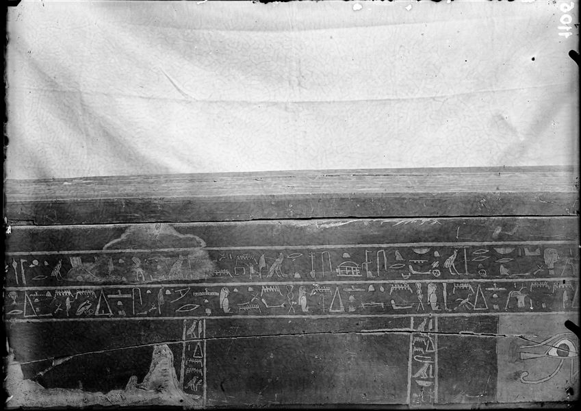 Coffin datable to the Middle Kingdom, photographed near the camp. S. 8918. East side. Schiaparelli excavations. 