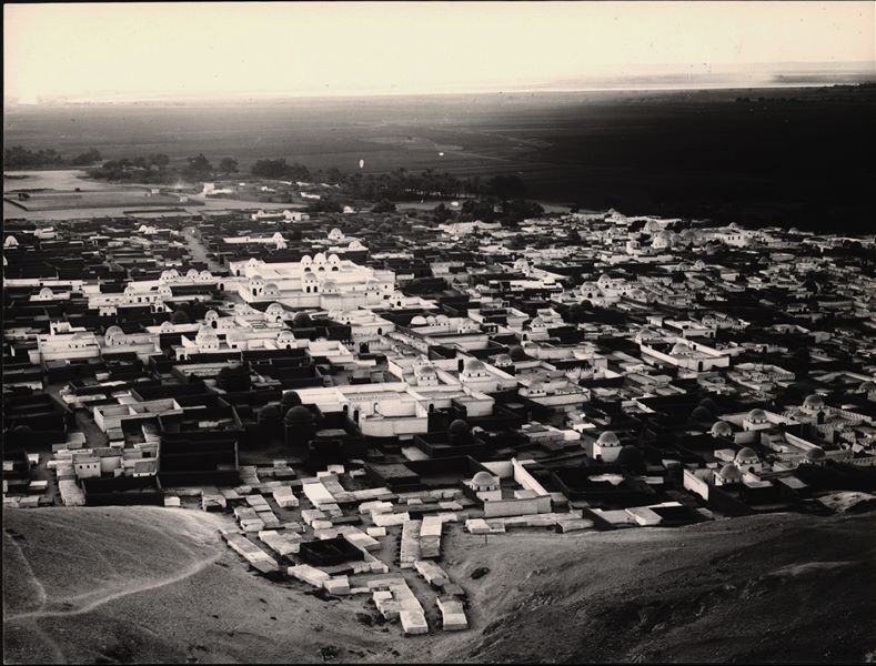 Landscape of the city of Asyut photographed from the mountain, site of the rock necropolis excavated by the Italian Archaeological Mission between 1906 and 1913.