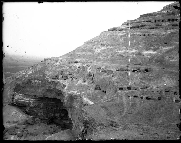  View of a section of the necropolis at Asyut, with a quarry (bottom left) still in use in 19th century. Schiaparelli excavations.