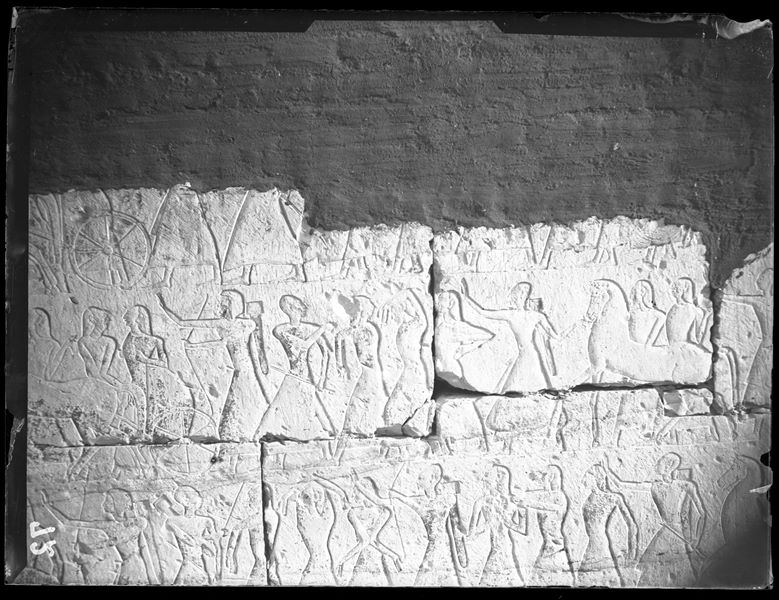 External wall (north and west) from the temple of Ramesses II at Abydos, scenes from the battle of Kadesh, rows of prisoners marching. 