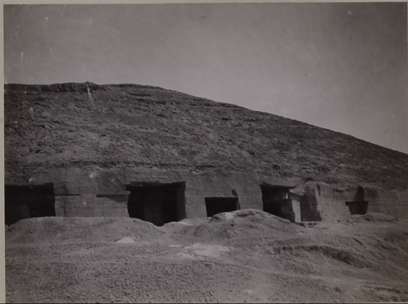 Photograph of one of the caves, used as a quarry, nearby to the Qau el-Kebir rock-cut tombs. Photo album, Schiaparelli excavations.