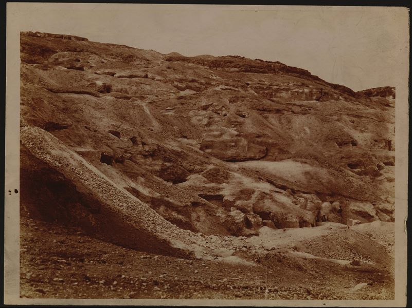 Excavations and view of the mountain near the rock-cut tombs of Hammamiya, where several tombs dated to the Old Kingdom were excavated. Schiaparelli excavations.