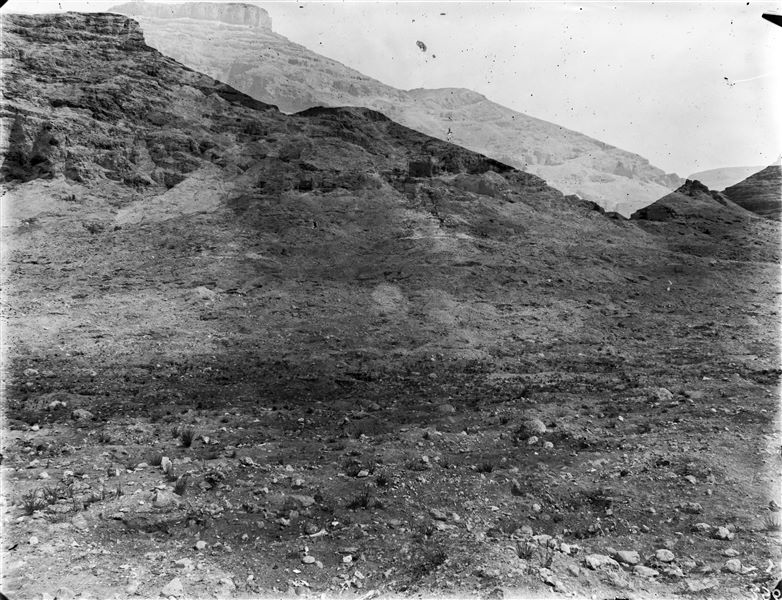 Double image of the same photographic plate depicting the rock-cut tombs with the tomb of Wahka II in the centre. Schiaparelli excavations.