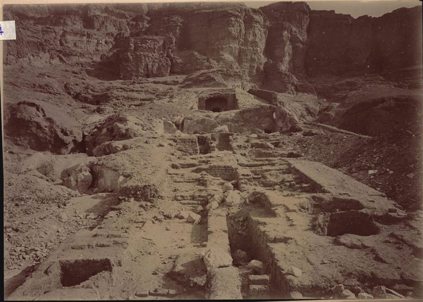 Excavations on the ascending ramp leading to the tomb of Governor Wahka I. The statue, still in situ can be seen in the centre of the photograph. Schiaparelli excavations. 