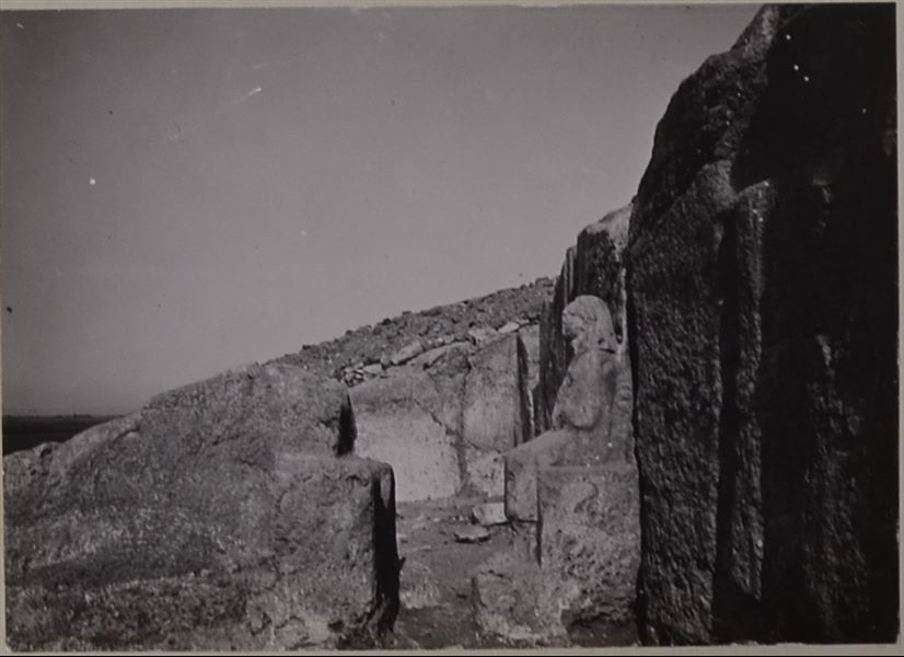 First courtyard of the tomb of Governor Wahka I, photograph of his statue, still in situ, seen from the left side. Photo album, Schiaparelli excavations.