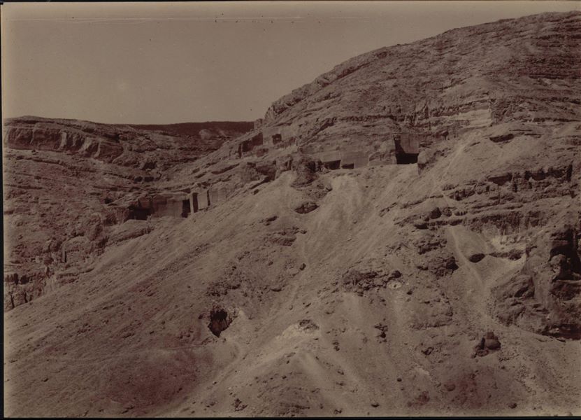 Distant view of the caves and stone quarries, presumably seen from the area of Wahka II's tomb. Very poorly preserved photograph, possibly due to excessive exposure to light, or a print that was too faint. Schiaparelli excavations.