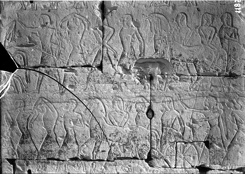 External wall (north and west) from the temple of Ramesses II at Abydos, scenes from the battle of Kadesh, rows of prisoners marching.