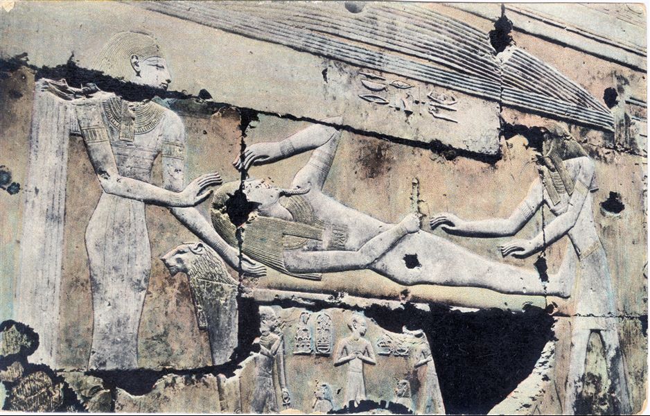 Detail from the chapel of Ptah-Sokar in the Temple of Seti I at Abydos. The scene depicts the resurrection of Osiris. The goddess Isis in the form of a bird, is resting on her husband's erect phallus, to be fertilised and thus generate their son Horus. The image was coloured later, not in accordance with the original colours. Album "Cartes postales" (Postcards).   