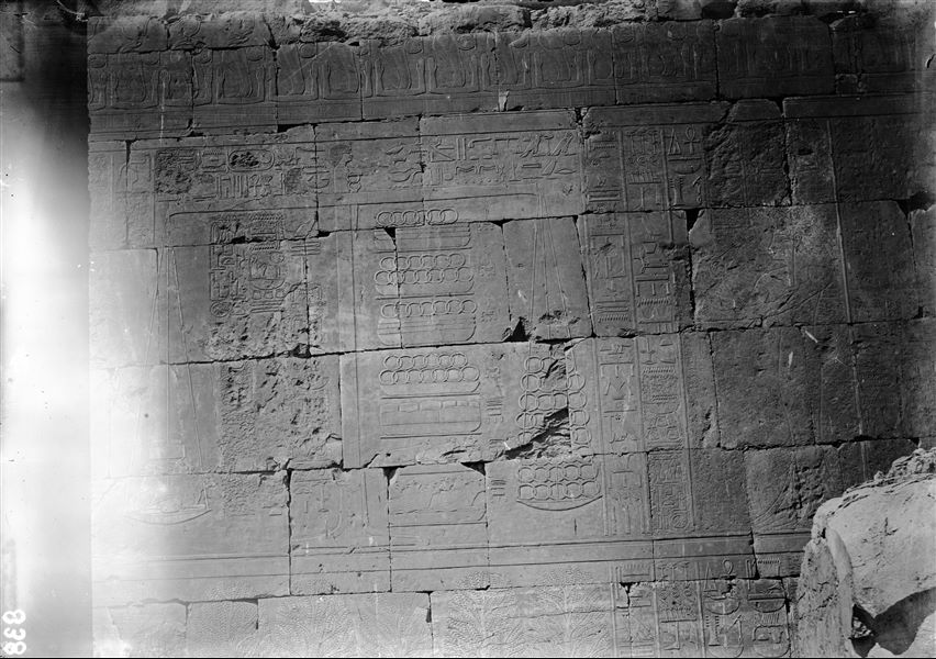 South side of the mortuary temple of Queen Hatshepsut at Deir el-Bahari. Wall scene from the portico in the middle terrace displaying the weighing of metal coming from the southern lands.