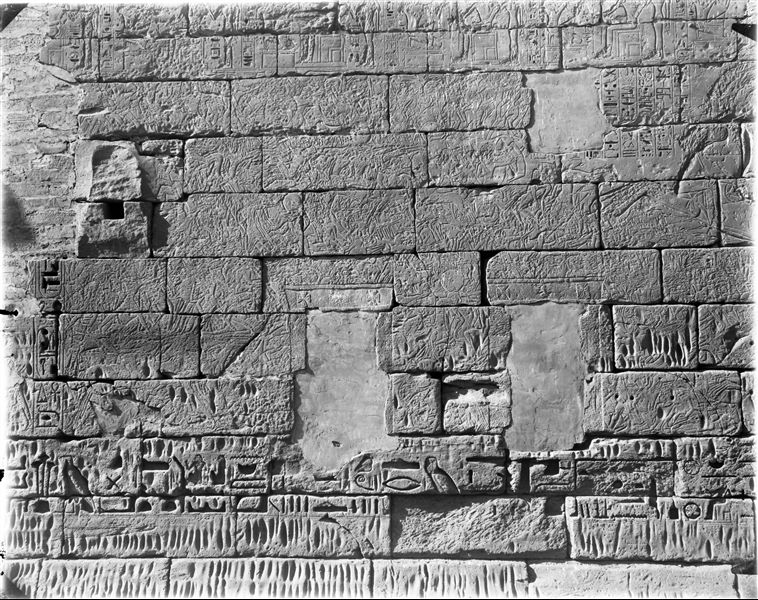 Battle scene between Ramesses III and the Sea Peoples on the external facade of the north wall from the temple of Ramesses III. 