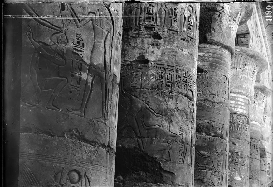 View of the colonnade, south side, west wall, in the first court of Ramesses III’s temple. 